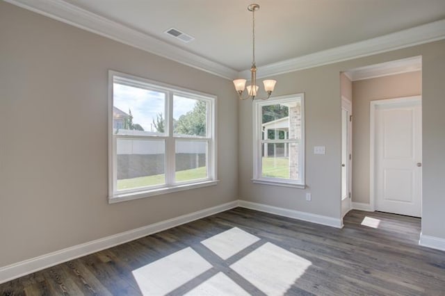 interior space featuring beam ceiling, an inviting chandelier, ornamental molding, coffered ceiling, and dark wood-type flooring