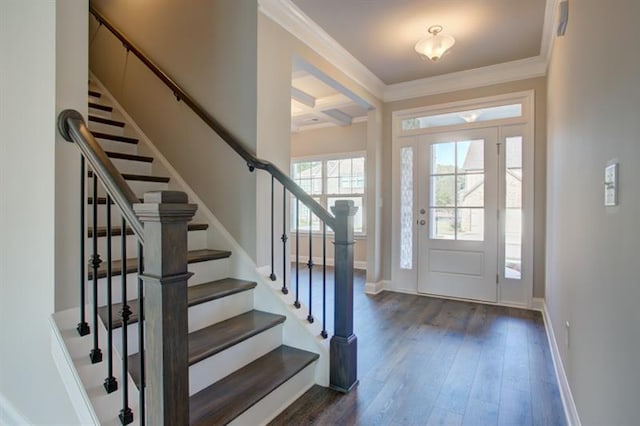 foyer featuring coffered ceiling, dark hardwood / wood-style flooring, beamed ceiling, and crown molding