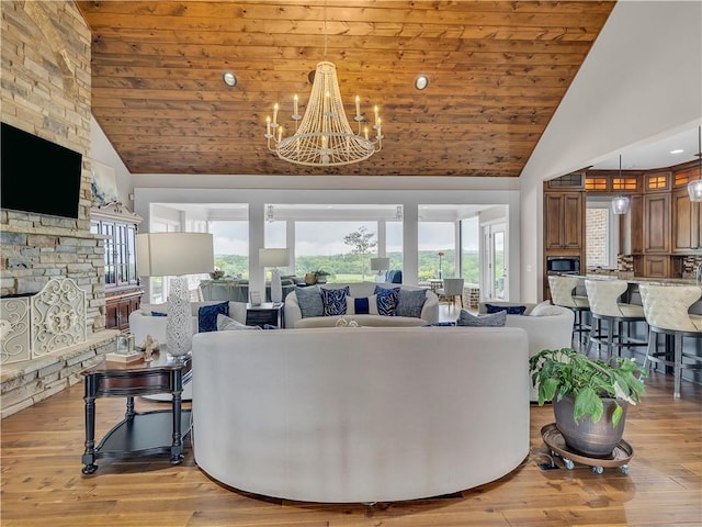 702 Cash Rd NE, Calhoun, GA 30701 - living room with high vaulted ceiling, wooden ceiling, light wood-style flooring, a chandelier, and recessed lighting