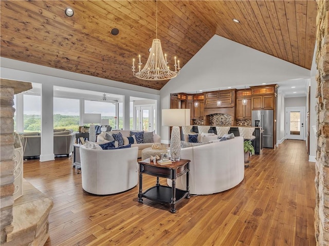 702 Cash Rd NE, Calhoun, GA 30701 - living room with high vaulted ceiling, light wood-style flooring, a chandelier, recessed lighting, and wooden ceiling