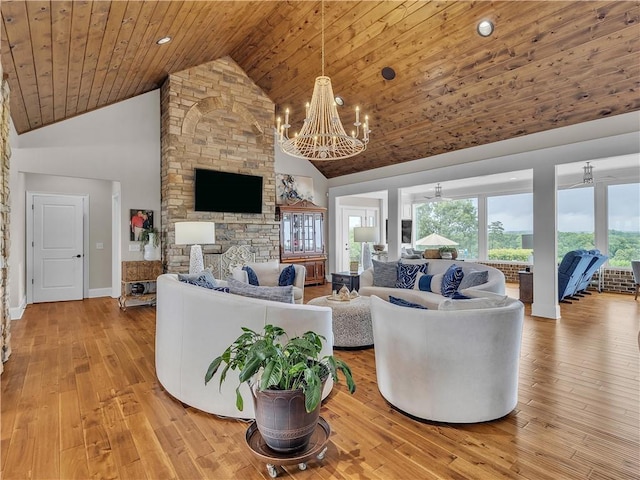 702 Cash Rd NE, Calhoun, GA 30701 - living room with high vaulted ceiling, wood ceiling, a chandelier, wood-type flooring, and a fireplace