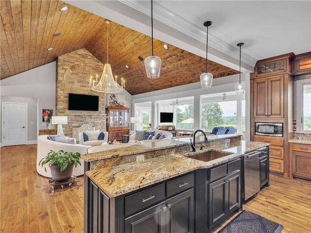 702 Cash Rd NE, Calhoun, GA 30701 - kitchen featuring light wood finished floors, stainless steel appliances, open floor plan, an island with sink, and wood ceiling