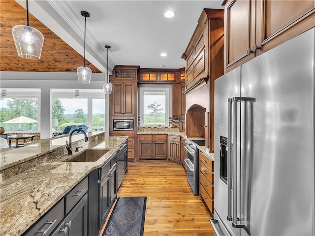 702 Cash Rd NE, Calhoun, GA 30701 - kitchen featuring appliances with stainless steel finishes, light wood-style flooring, decorative light fixtures, recessed lighting, and decorative backsplash
