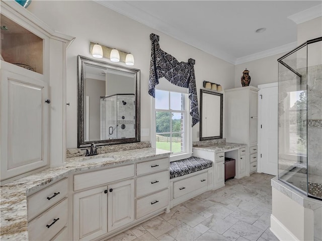 702 Cash Rd NE, Calhoun, GA 30701 - full bath featuring crown molding, a shower stall, two vanities, and marble look tiles
