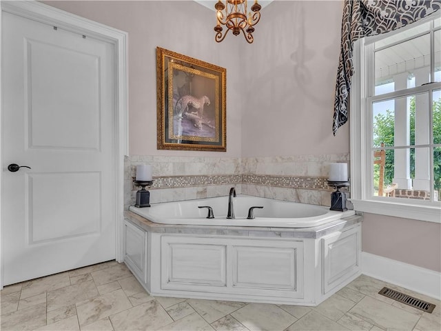 702 Cash Rd NE, Calhoun, GA 30701 - full bathroom with marble look tiles and a bath