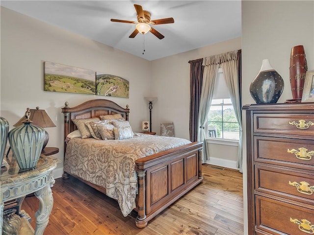 702 Cash Rd NE, Calhoun, GA 30701 - bedroom featuring light wood-type flooring and a ceiling fan