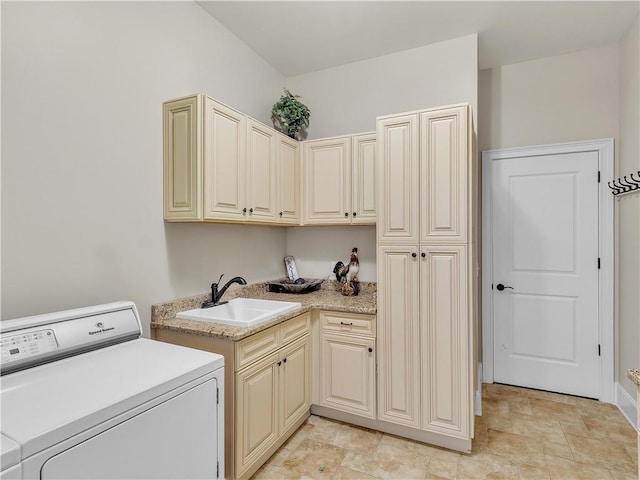 702 Cash Rd NE, Calhoun, GA 30701 - laundry room featuring cabinet space, stone finish floors, and independent washer and dryer