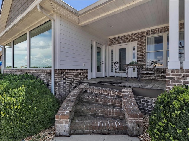 702 Cash Rd NE, Calhoun, GA 30701 - view of exterior entry with brick siding and covered porch