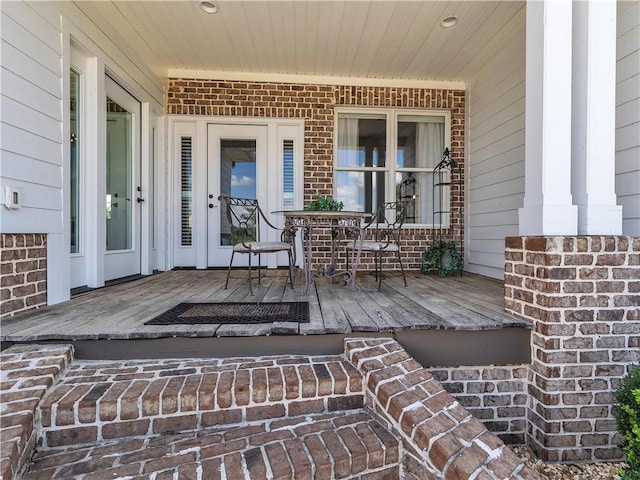 702 Cash Rd NE, Calhoun, GA 30701 - doorway to property featuring brick siding and covered porch