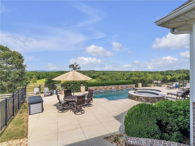 702 Cash Rd NE, Calhoun, GA 30701 - view of swimming pool featuring a patio and a pool with connected hot tub