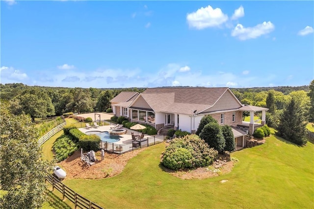 702 Cash Rd NE, Calhoun, GA 30701 - view from above of property featuring a pool and a heavily wooded area