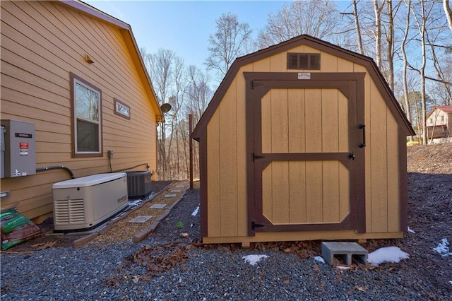 view of shed with central AC unit