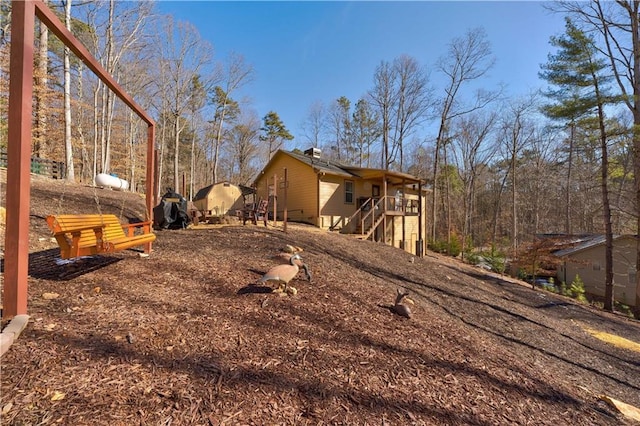 view of home's exterior with stairway