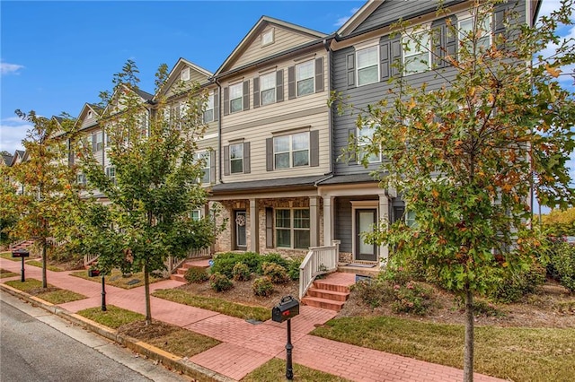 multi unit property featuring covered porch