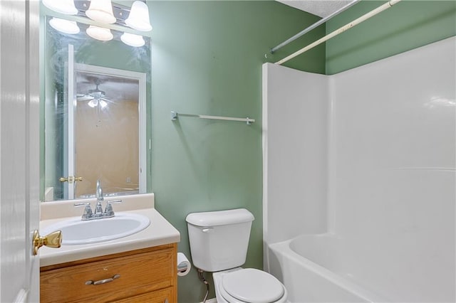 3127 Fields Dr, Lithonia, GA 30038 - bathroom featuring vanity, toilet, and shower / bath combination