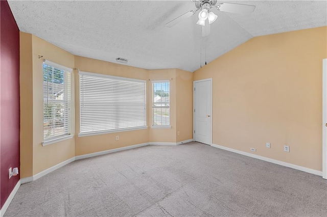 3127 Fields Dr, Lithonia, GA 30038 - unfurnished room featuring carpet, a ceiling fan, lofted ceiling, baseboards, and a textured ceiling