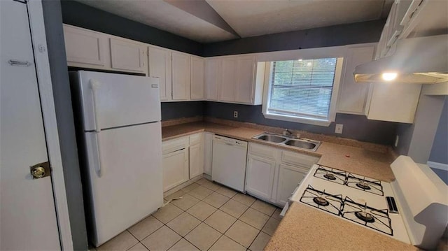 kitchen featuring light tile patterned floors, white cabinets, sink, and white appliances