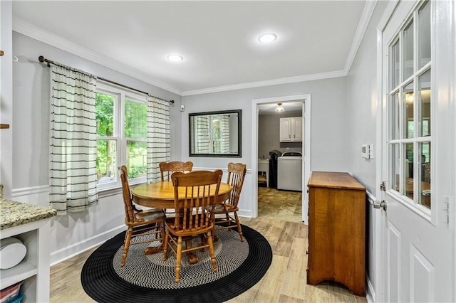 135 Crimson Rdg, Tyrone, GA 30290 - dining space featuring washer / dryer, ornamental molding, light wood-type flooring, baseboards, and recessed lighting