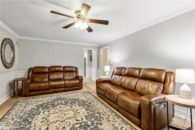 135 Crimson Rdg, Tyrone, GA 30290 - living area featuring wood finished floors, ceiling fan, and crown molding