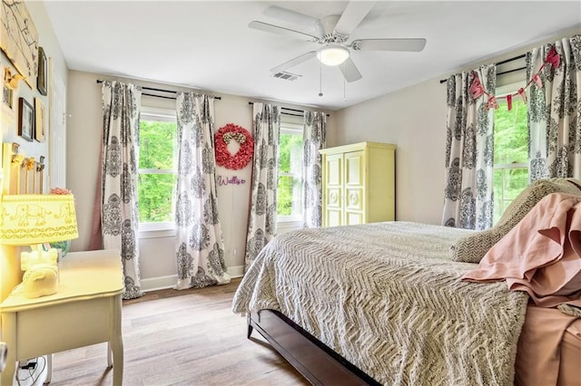 135 Crimson Rdg, Tyrone, GA 30290 - bedroom with wood finished floors, a ceiling fan, and baseboards