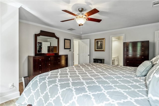 135 Crimson Rdg, Tyrone, GA 30290 - bedroom with crown molding, wood finished floors, baseboards, ceiling fan, and ensuite bath