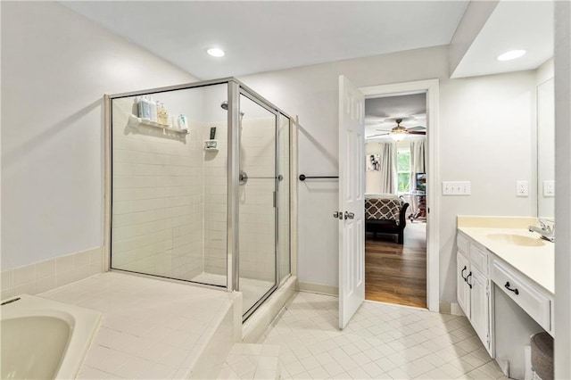 135 Crimson Rdg, Tyrone, GA 30290 - full bath with ensuite bathroom, a stall shower, vanity, tile patterned flooring, and ceiling fan