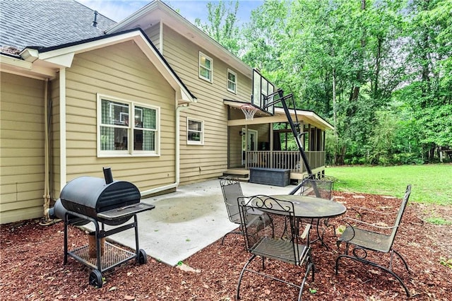 135 Crimson Rdg, Tyrone, GA 30290 - rear view of house with a patio, a lawn, and roof with shingles