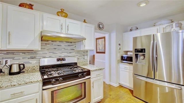 kitchen featuring white cabinetry and stainless steel appliances