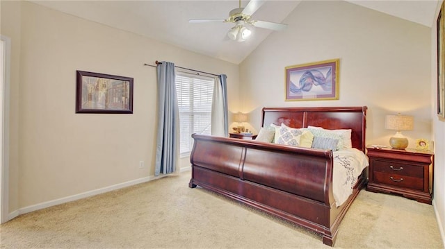 bedroom featuring vaulted ceiling, light carpet, and ceiling fan