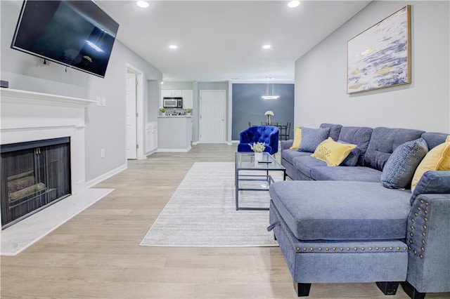 living room featuring light wood-type flooring