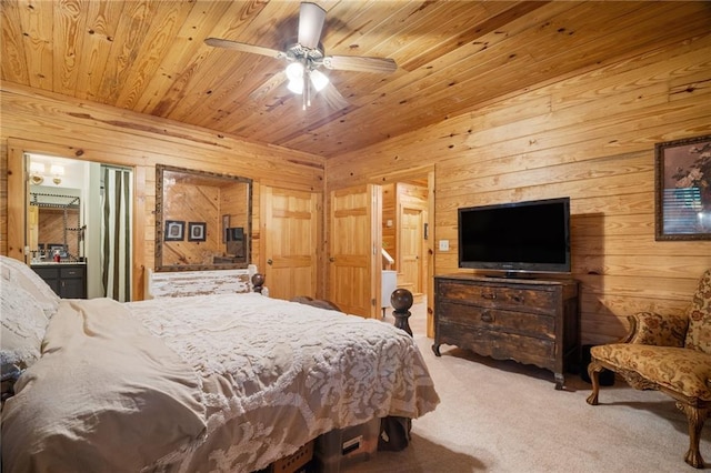 carpeted bedroom with wood walls and wood ceiling