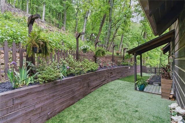 view of yard with a fenced backyard