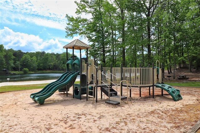community jungle gym featuring a water view