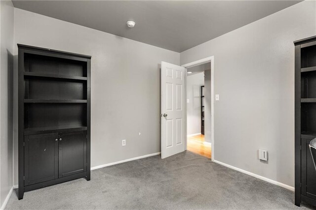 148 Waverly Way Unit 10, Atlanta, GA 30307 - unfurnished bedroom with carpet floors and baseboards