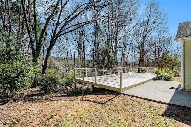 view of yard featuring a wooden deck