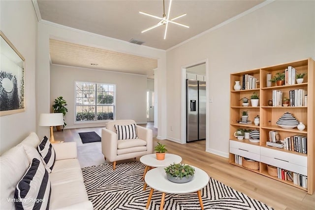 living area featuring crown molding, baseboards, visible vents, and light wood finished floors