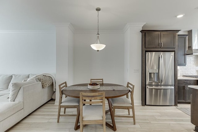 1117 Larkin Dr, Buford, GA 30518 - dining room with crown molding and light wood-type flooring