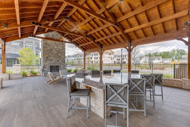 1117 Larkin Dr, Buford, GA 30518 - view of patio featuring an outdoor stone fireplace