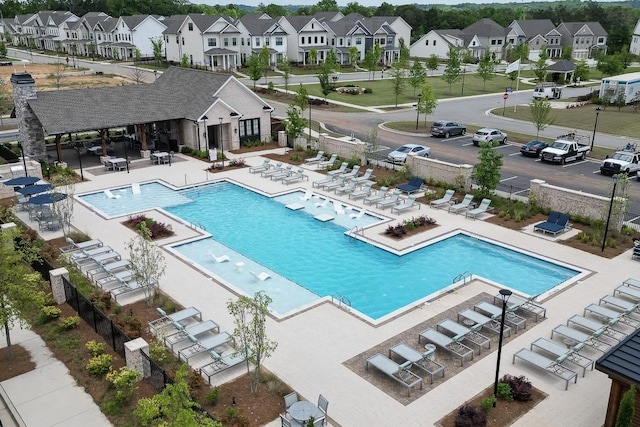 1117 Larkin Dr, Buford, GA 30518 - community pool featuring a residential view and a patio area