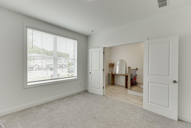 1117 Larkin Dr, Buford, GA 30518 - bedroom featuring light carpet and baseboards