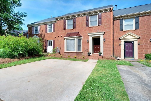 view of front of house with brick siding