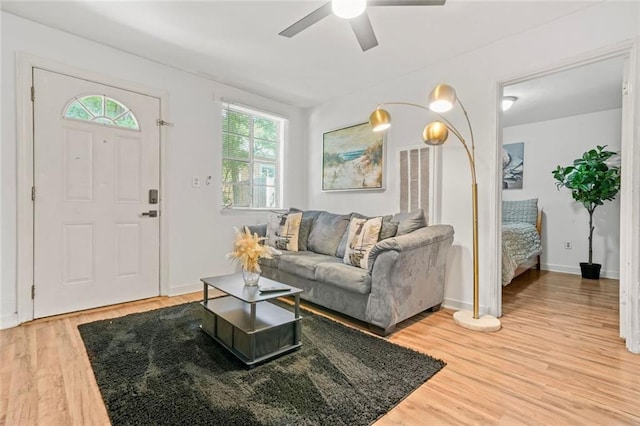 210 Estoria St SE, Atlanta, GA 30316 - living area featuring ceiling fan, light wood-style floors, and baseboards