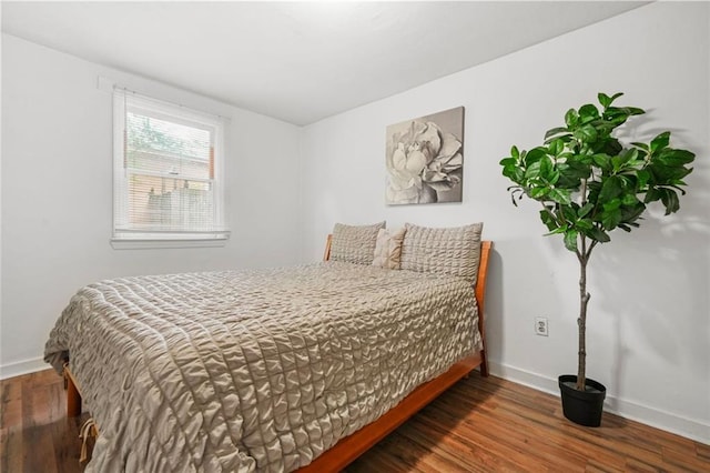 210 Estoria St SE, Atlanta, GA 30316 - bedroom featuring baseboards and wood finished floors
