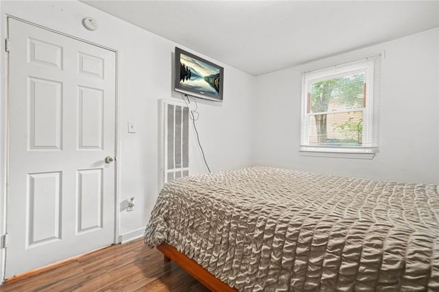 210 Estoria St SE, Atlanta, GA 30316 - bedroom with wood finished floors and a heating unit