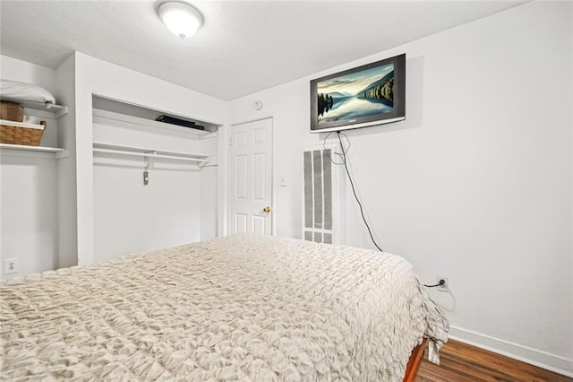 210 Estoria St SE, Atlanta, GA 30316 - bedroom with wood finished floors, baseboards, and a closet