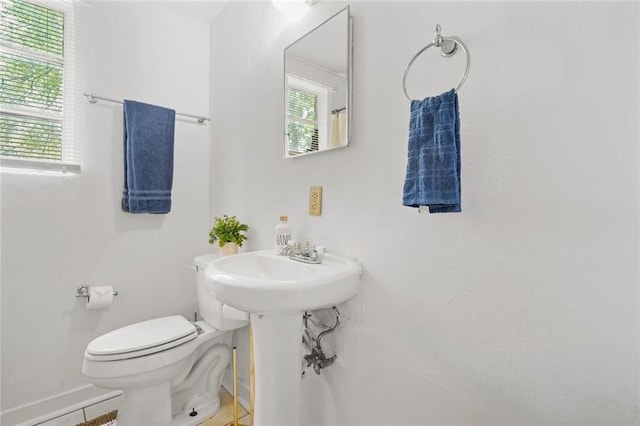 210 Estoria St SE, Atlanta, GA 30316 - bathroom featuring toilet, plenty of natural light, and a sink
