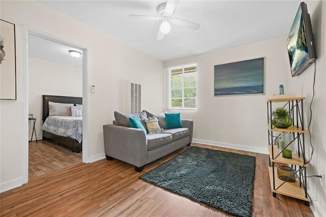210 Estoria St SE, Atlanta, GA 30316 - living area featuring wood finished floors, ceiling fan, and baseboards