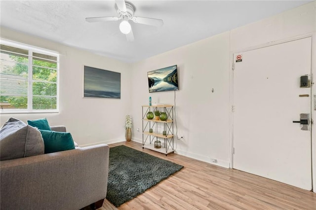 210 Estoria St SE, Atlanta, GA 30316 - living room featuring light wood-style floors, ceiling fan, and baseboards
