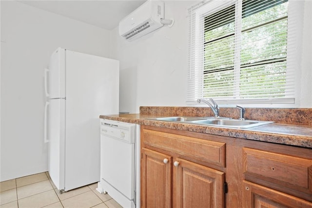 210 Estoria St SE, Atlanta, GA 30316 - kitchen featuring white appliances, a sink, a wall mounted air conditioner, and plenty of natural light