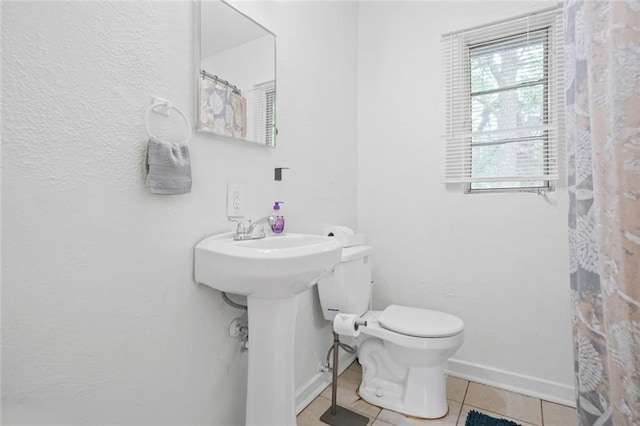 210 Estoria St SE, Atlanta, GA 30316 - full bathroom with tile patterned floors, toilet, and baseboards